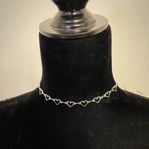 Silver toned heart choker necklace